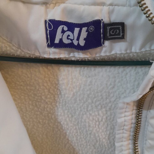 Women's jacket used, white, size S with quilted lining