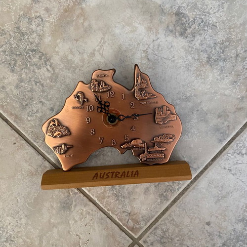 Bronze Australia-shaped clock