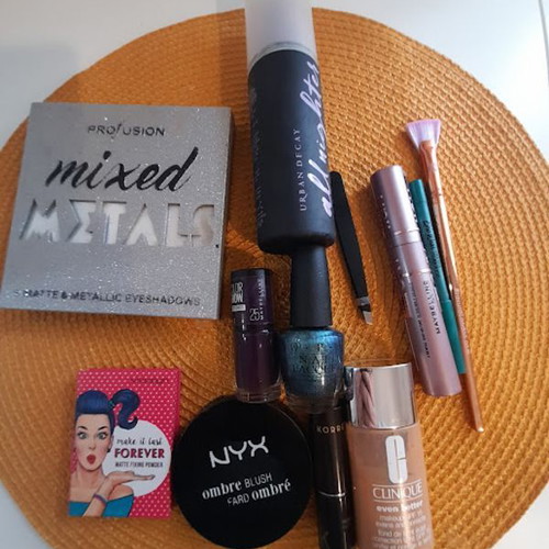 Set of used cosmetics with new Maybeline Sky High mascara
