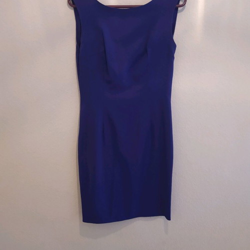 blue dress with an opening at the back