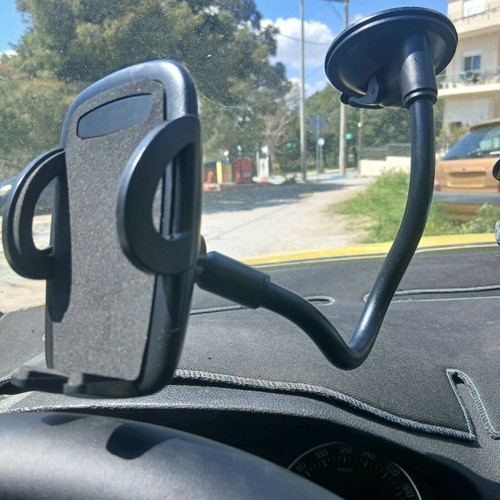 Mobile phone holder with flexible arm and clip for windshield or dashboard