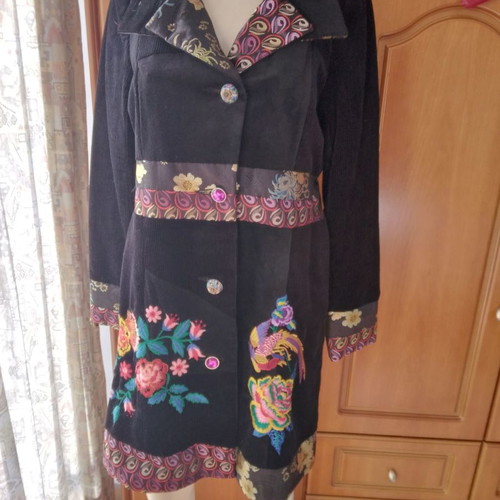 Black corduroy/velvet coat like new, size L/XL with colorful designs
