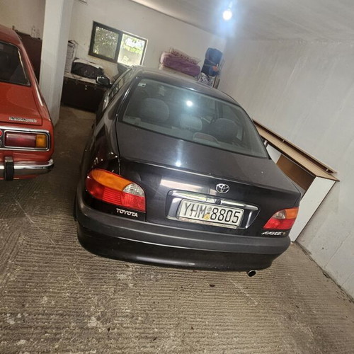 Toyota Avensis 1.6 sedan used, black, manual transmission, 1999