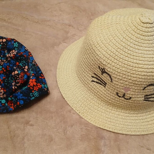 Set of two children's hats used, straw and swim cap