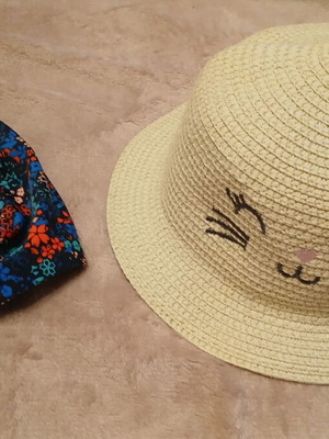 Set of two children's hats used, straw and swim cap