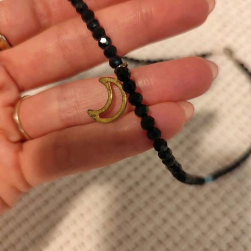Necklace with black beads and crescent pendant like new