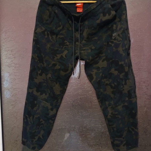 Nike Tech Fleece pants, size M, black and green