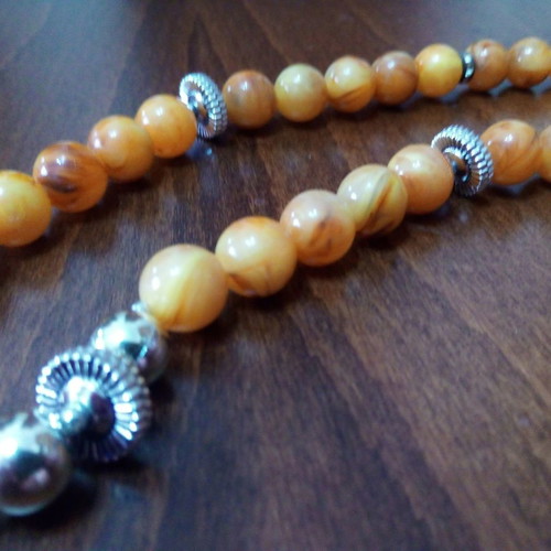 Vintage bakelite necklace used honey color with metal details