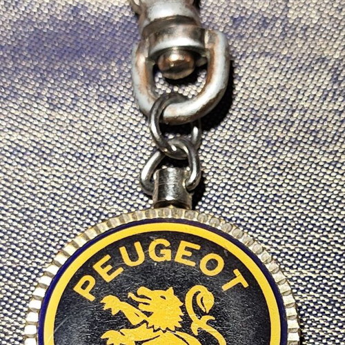 Peugeot vintage double-sided keychain used