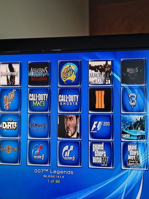 PlayStation 3 Super Slim HEN 500GB console with cables and many games