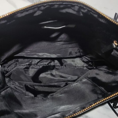 H&M crossbody bag used with black fringes