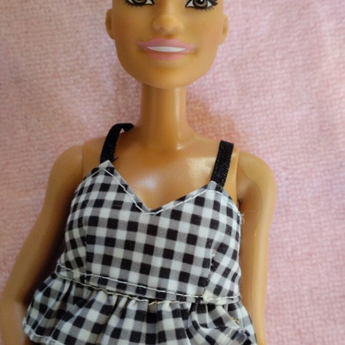 Barbie doll 2015 used with small mark on head