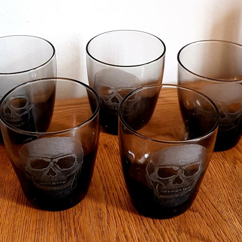 Collectible whiskey and vodka glasses, pack of 5, new with engraved skull