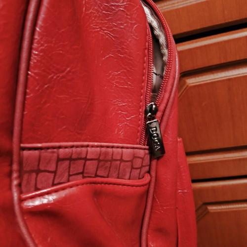 Doca leather backpack used, red with silver details