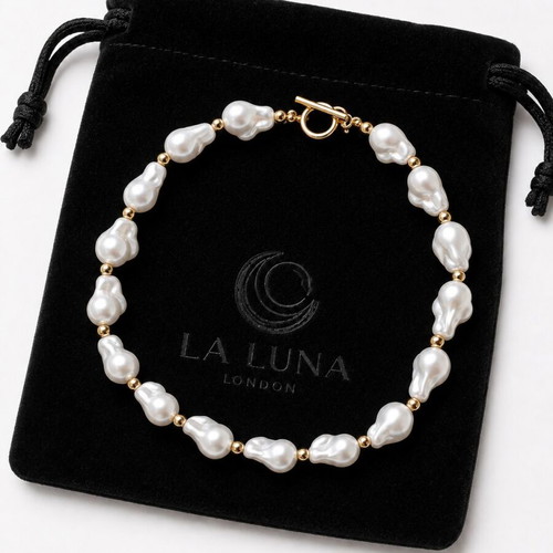 Women's bracelet with Baroque pearls and gold details