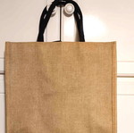 Straw shopper bag with flowers and butterflies in yellow and orange with gift pouch
