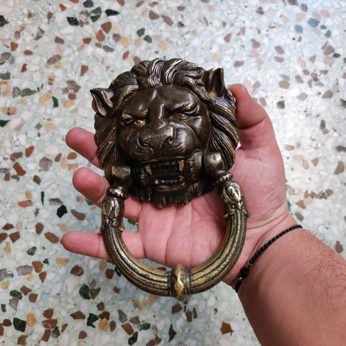 Bronze door knocker like new with lion face for solid door