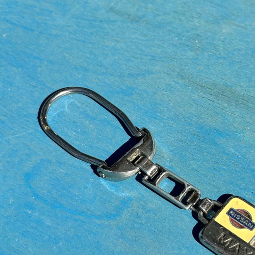 Nissan Maxima Vintage Metal Keychain used, 5.1 cm
