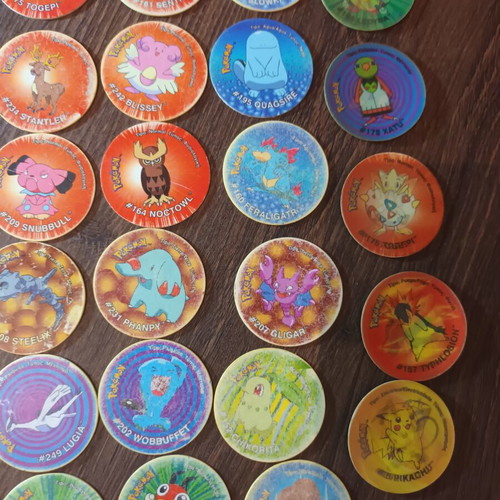 Pokemon tazos set with 36 flat and 5 3D tazos