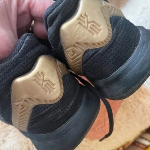 Nike athletic shoes size 42.5 like new, black and gold