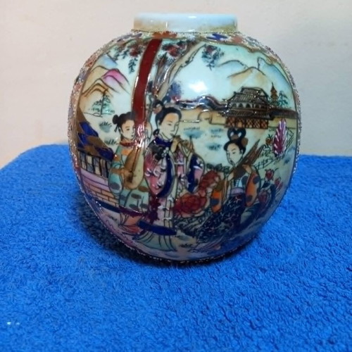 Satsuma vase used with handpainted floral motifs and crackle glaze