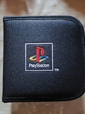 Sony vintage PS2 disc wallet with 14 used PAL games