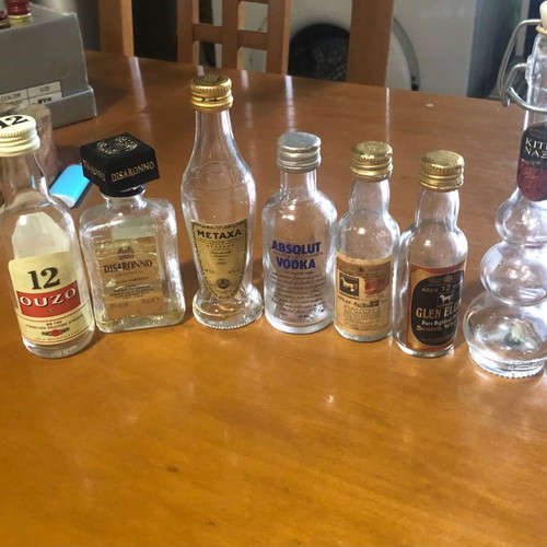 Glass miniature bottles used, pack of 7, vintage spirit collection