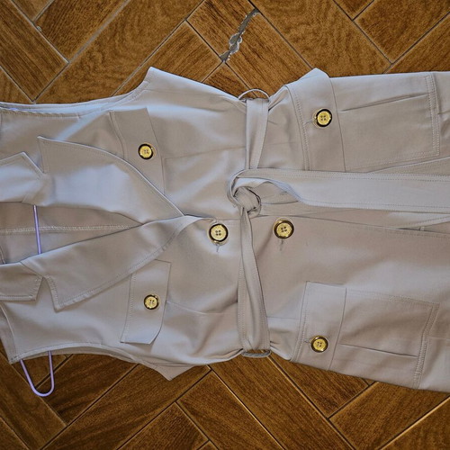 Pirouette women's beige vest like new with belt