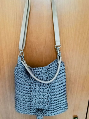 Handmade knitted shoulder bag with metallic details, beige and gray