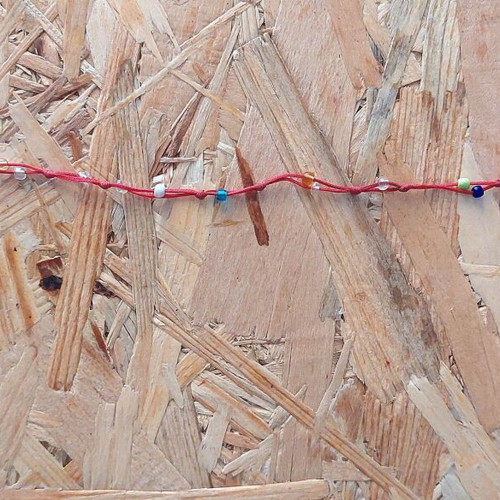 Handmade anklet with multicolored beads, red