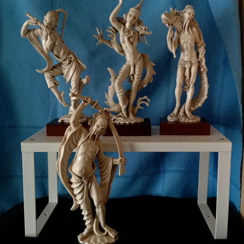 Asian figurines used, resin or plastic, set of 4