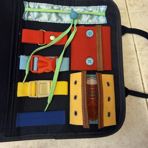 Montessori activity bag with dinosaur design, felt busy board