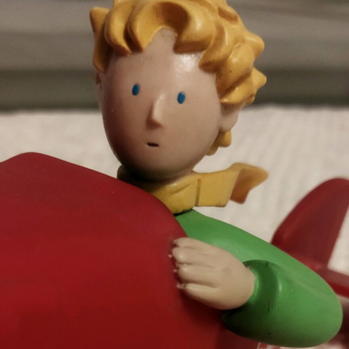Le Petit Prince figure decorative like new with red airplane