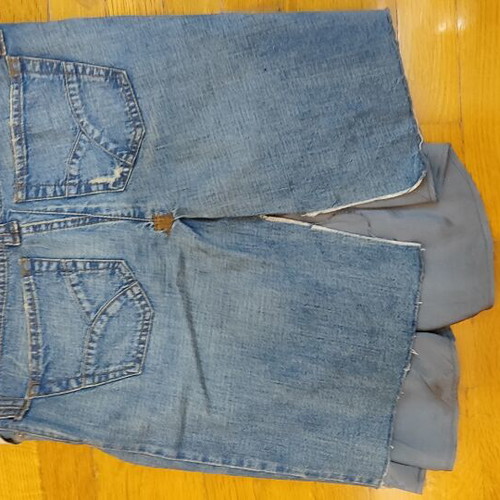 Skirt combining denim and satin fabric with floral details, like new