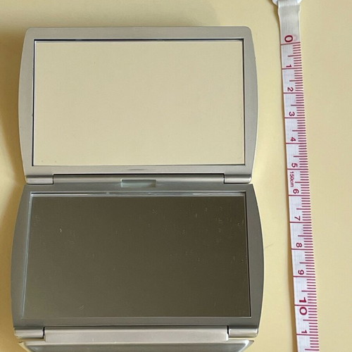 Folding Bag Mirror like new with magnifying side