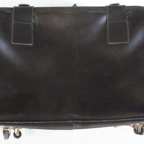 Leather travel suitcase used, 1980s, with wheels and locks