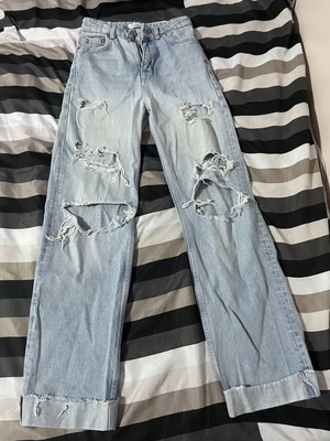 Pull & Bear ripped jeans with wide leg size 32