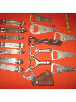 Collection of old bottle openers used, leather camel