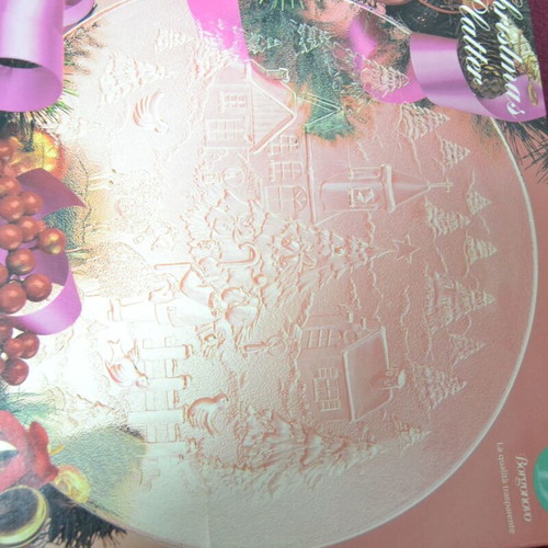 Serving platter new with Christmas embossed design