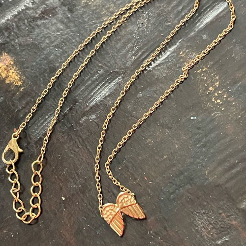 Necklace new, gold color, faux bijou with feathers