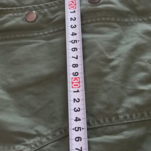 Tommy Hilfiger sleeveless jacket green like new
