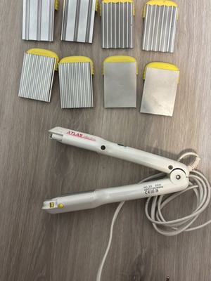Atlas hair straightener used with 4 replacement sets