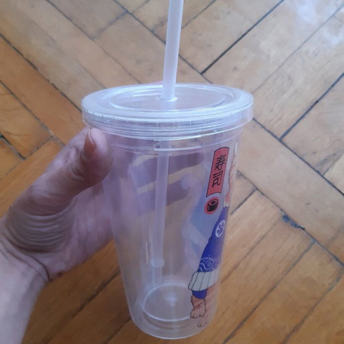 Cup with straw used, double wall for coffee and juices