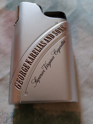 George Karelias & Sons metal lighter new, Superior Virginia Cigarettes