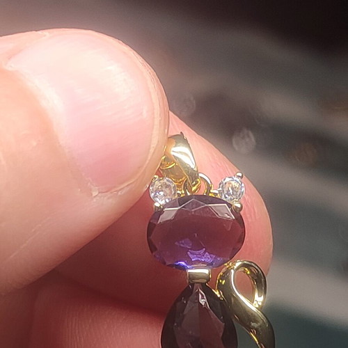 Women's necklace with purple stones