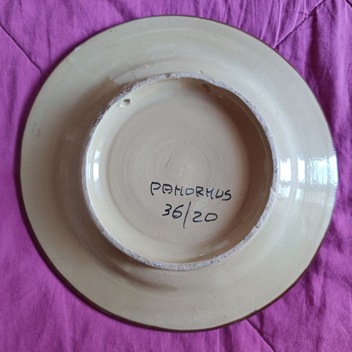 Decorative ceramic plate with hand-engraved floral motif, like new