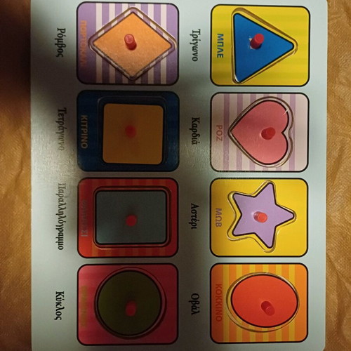Wooden puzzle like new with shapes and colors