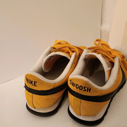 Nike women's athletic shoes used size 39 yellow