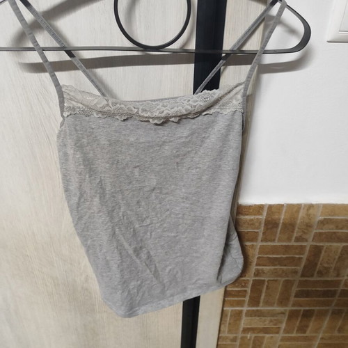 Women's grey top with thin straps and lace neckline