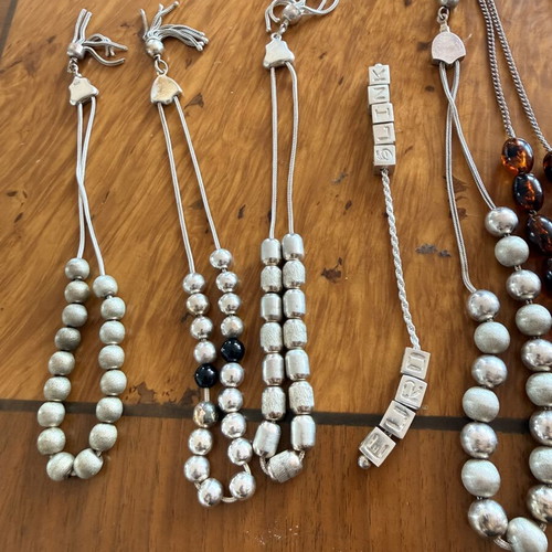 Vintage collection of 17 komboloi with natural amber and 925 silver
